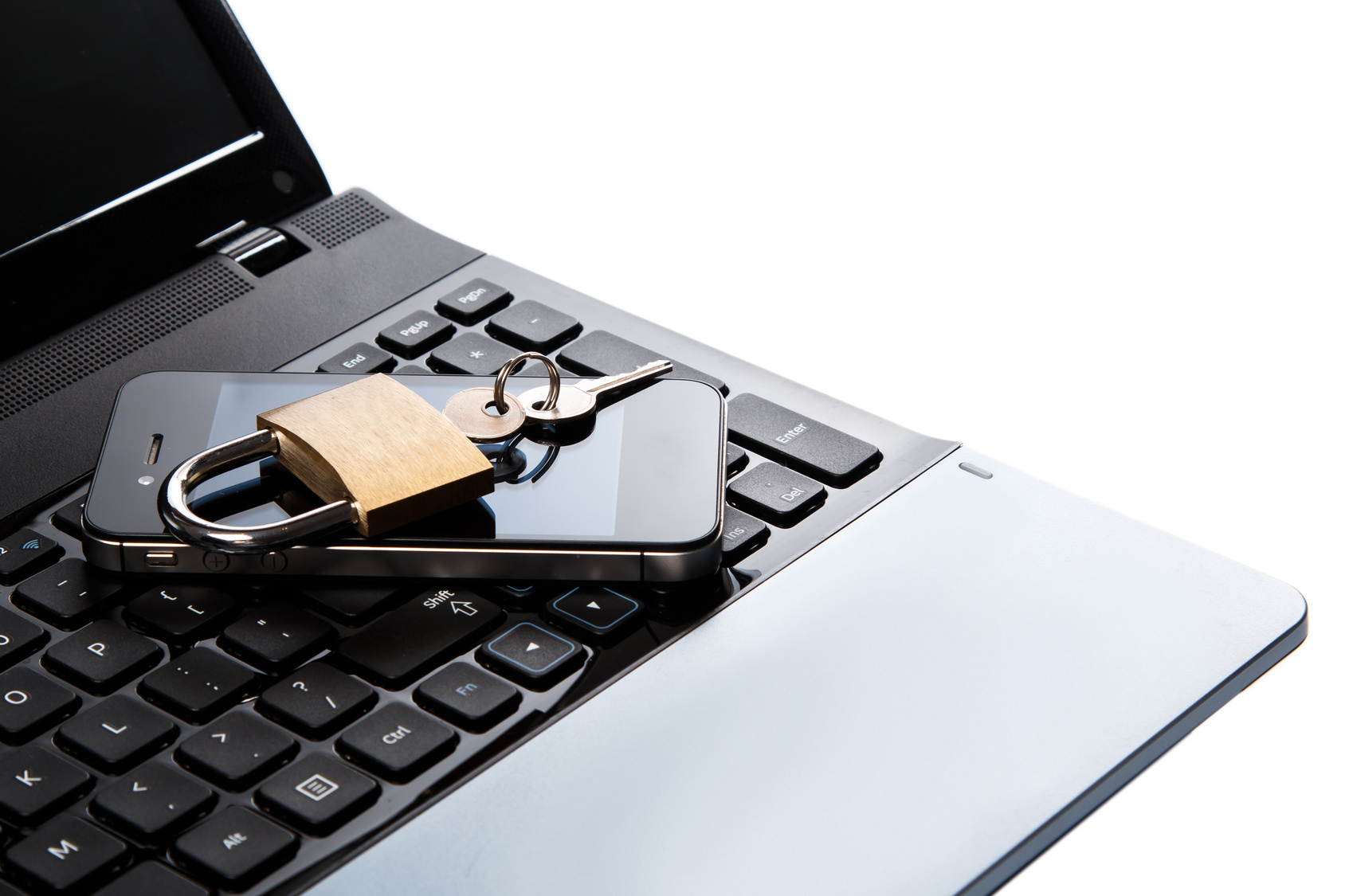 Smartphone And Padlock Is Lying On A Laptop Keyboard